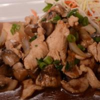 Mushroom Lover With Chicken · Stir-fried in garlic brown sauce, scallions, yellow onions, and three types of mushrooms.