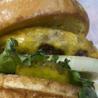 Louie’S Crazy Burger · Yellow Mustard Garlic Aioli, American Cheese, Cheddar Cheese, Lettuce, Tomato, Sliced Onion,...