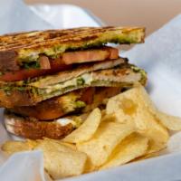 Chicken Pesto Panini · Grilled chicken with our homemade pesto pasta, topped off with fresh mozzarella and tomato.