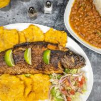Trucha (Hornada O Frita) · Broiled or fried trout. Served with rice, beans, and salad. Choice of french fries or toston...
