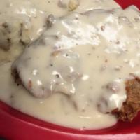 Chicken Fried Steak · Our tenderized steak hand-breaded, fried, and covered in gravy. Served with the vegetable of...
