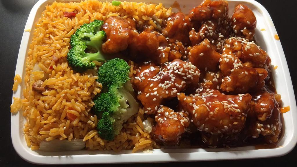 Sesame Chicken · Served with white rice & sauce on the side.