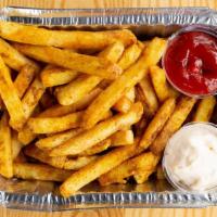 Curry Fries · Crispy fries dusted with curry spice and a side of garlic mayo (v) (GF)