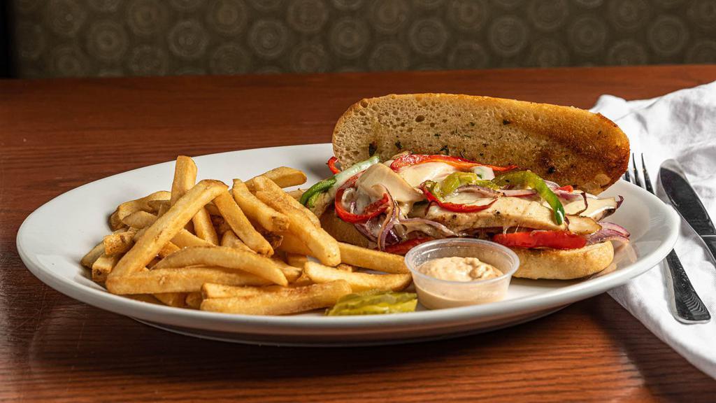 Chicken Philly · Sliced Chicken Breast, Peppers, Onions, and Mushrooms all in a French Bread.