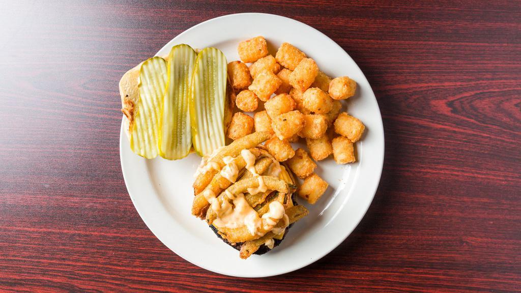 Get Pickled Burger · American cheese, grilled chopped onions, and our Signature house sauce. Topped off with breaded pickle fries.