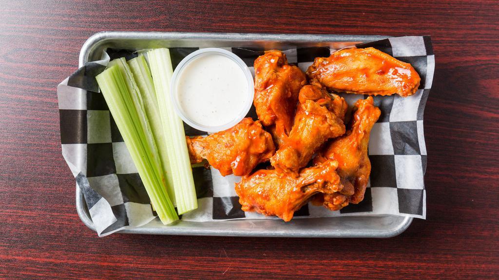 Traditional Or Boneless Wings · Served with celery and ranch or blue cheese dressing.