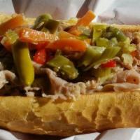 Italian Beef · Generous serving of Italian beef soaked in au jus. All sandwiches served on fresh Italian br...