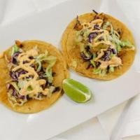Shrimp Taco · Shrimp comes with lettuce/red cabbage and special seafood sauce.