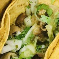 Tripas Taco · Cow intestines. Comes with onion and cilantro.