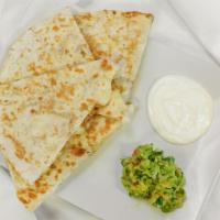 Pollo Asado/Chickenquesadilla · 6” hand made corn quesadilla filled with the best chicken you ever tasted and cheese. Yummy!.