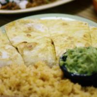Quesadilla · Flour tortilla, your choice of meat, mozzarella cheese, rice, beans and guacamole.