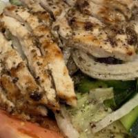Greek Salad · Onions, green pepppers, tomato, cucumber, feta cheese, olives, and Greek dressing.