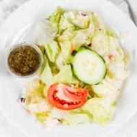 Dinner Salad · Mixed greens, tomato, and cucumber.