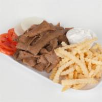 Gyro Dinner · Served open faced with Greek salad and french fries.