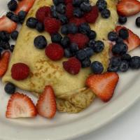 Very Berry Crepe · Filled with strawberry cream cheese and strawberries, topped with blueberries and raspberries