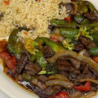 Steak Stir Fry · Served with rice and soup or salad