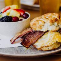 Wonderful Day · Sausage patty, candied bacon, smoked gouda, fried egg and house blackberry jam on a buttermi...