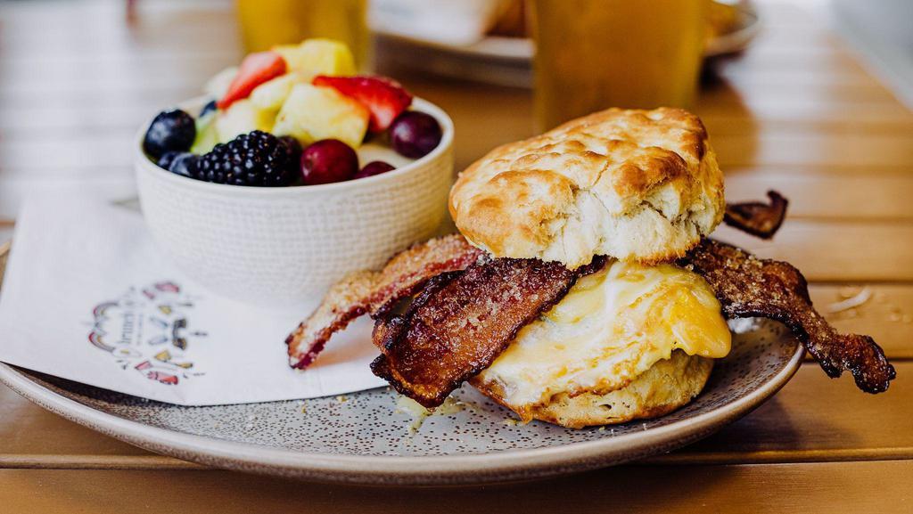 Wonderful Day · Sausage patty, candied bacon, smoked gouda, fried egg and house blackberry jam on a buttermilk biscuit