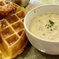 Chicken & Waffle · Belgian waffle, crispy chicken strips, two eggs cooked to order, and pork sausage gravy. Lim...