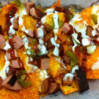 Bbq Nachos · Smoked hot link & bologna, cheddar cheese, layered on a bed of doritos, topped with jalapeno...