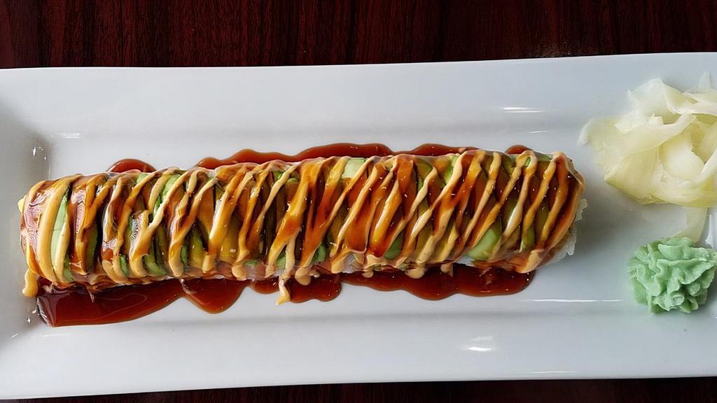 Dragon Roll · In Eel, cucumber, avocado, Out- Avocado, ell sauce, and spicy mayo.