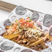 Carne Asada Fries Small · Fresh cut French fries topped with asada (steak) or (choice of meat), cheese, chipotle sour ...