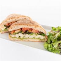 Pesto Chicken Sandwich · Roasted chicken, shredded mozzarella cheese, sliced tomatoes, spring mix, with balsamic vina...