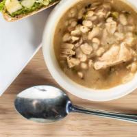 C - White Bean Chicken Chili · Slow-simmered chicken and white beans in a roux-thickened chicken stock with tangy sour crea...