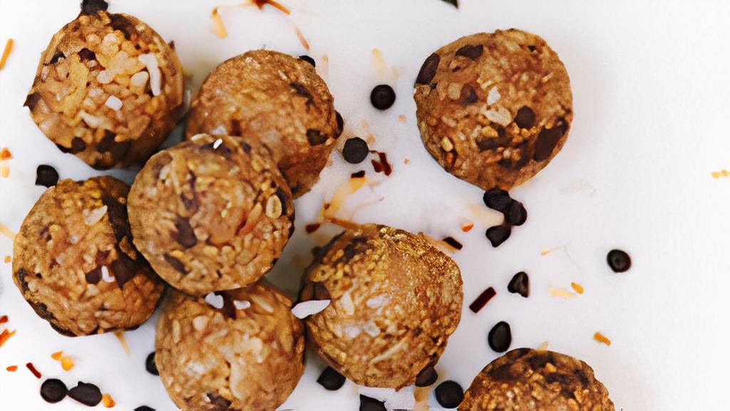Peanut Butter Bites · Delicious bite-sized snacks made with honey, oats, peanut butter, flaxseed, vanilla, toasted coconut, and chocolate. It comes in a pack of four.