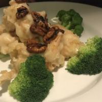 Honey Walnuts · Battered chicken or jumbo shrimp fried, tossed in sweet creamy, grand mariner sauce and cara...