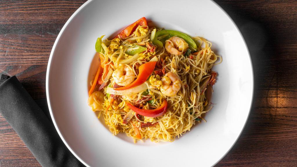 Singapore (Bbq Pork & Shrimp) · Spicy. Thin rice noodle with barbecue pork, shrimp, sautéed onion, bell peppers, carrot, bean sprout, scallion and egg in a light curry powder.