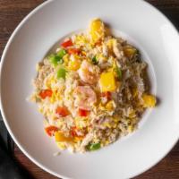 Pineapple Fried Rice · Stir-fried with egg, red and green pepper, onion and pineapple.
