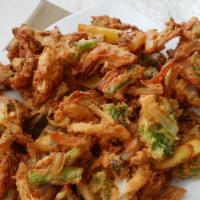 #3. Vegetable Pakora · Veggie. Mixed vegetables dipped in batter and fried.