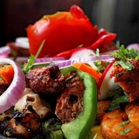 #24. Reshmi Mixed Grill Platter · Tandoori chicken, chicken tikka, chicken kabab, shrimp tandoori, sheek kabab.