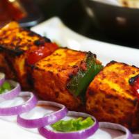 #23. Paneer Tikka · Cubes of paneer marinated in spices and grilled in the tandoor.
