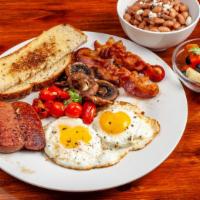 English Breakfast · Eggs, bacon, beans, toast, sausage, stewed tomatoes, and mushrooms.