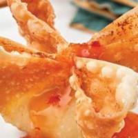 Crab Rangoon · Fried wonton wrapper filled with crab and cream cheese.