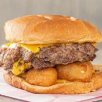 Cheese Head Burger · Layered with cheese on top of cheese curds, on an onion roll.