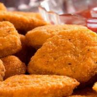 Chicken Nuggets 12 Pc · 12PC NUGGETS Served with fries,bread,coleslaw