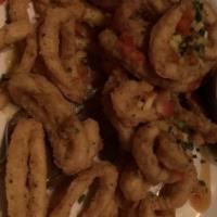 Fried Calamari · Mango Chile Mojo Sauce, diced mangos, red bell peppers, and chives