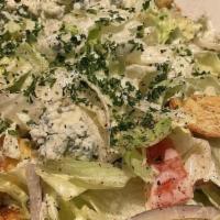 Chophouse Salad · Bleu Cheese Crumbles, Hearts of Palm, Croutons, Blue Cheese Dressing on the side