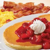 Big Pancake Breakfast · 2 large pancakes, 3 eggs*, double order of Applewood smoked bacon (6 slices) or country saus...