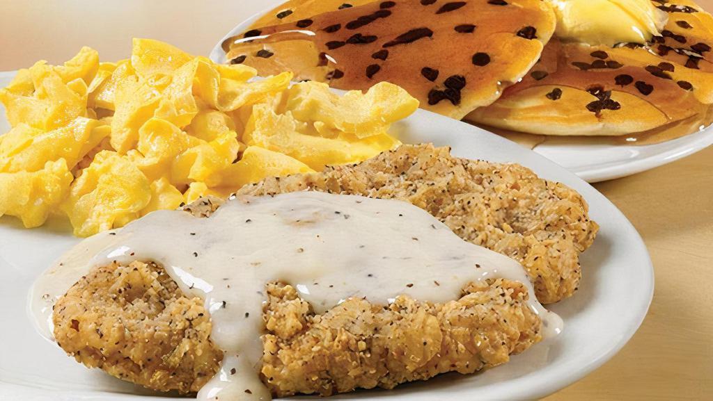 Country Pancake Platter · Your choice of country ham, sugar cured ham or country fried steak, with 2 eggs* and 2 large pancakes (any same style) (Cal 910-1540)
