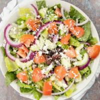 Greek Salad · Lettuce, tomatoes, onions, cucumbers, feta cheese and Greek olives with Greek dressing.