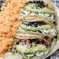 Vegetarian Taco Plate · Vegetarian. Two corn tortillas with black beans, grilled green peppers, grilled onion, tomat...
