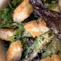 Caesar · Mixed Greens, Hand-carved Grilled Chicken, Croutons, Parmesan Cheese, Caesar dressing.