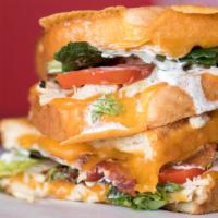 Chicken Bacon Ranch · Mild cheddar, wheat, beef-bacon, hand carved chicken, roma tomato, ranch.