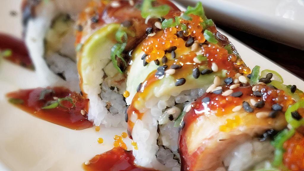 Dragon Roll · Toasted eel and cucumber topped with avocado and tobiko.