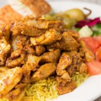 Shawarma · Chicken thighs marinated in middle eastern seasonings, hand carved from a slow roasting roti...
