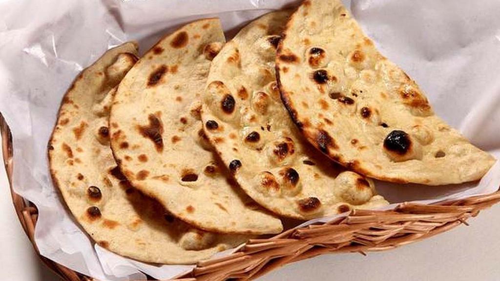 Tandoori Roti · Whole wheat Indian bread baked in the tandoor.